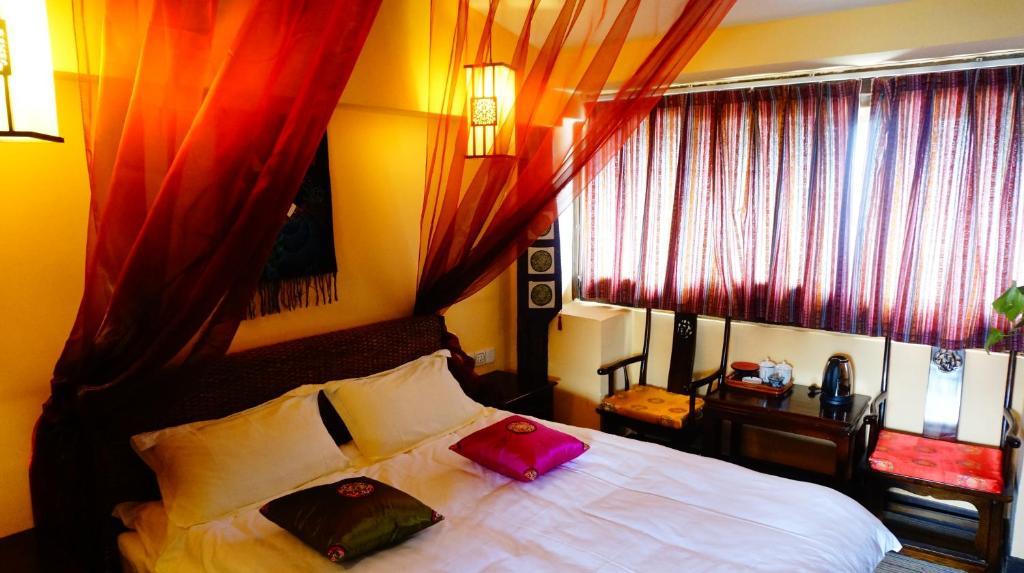 Lijiang Wangjia Courtyard Inn Kamer foto