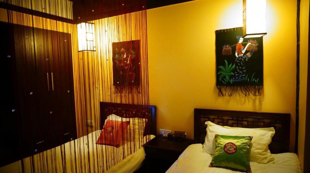 Lijiang Wangjia Courtyard Inn Kamer foto