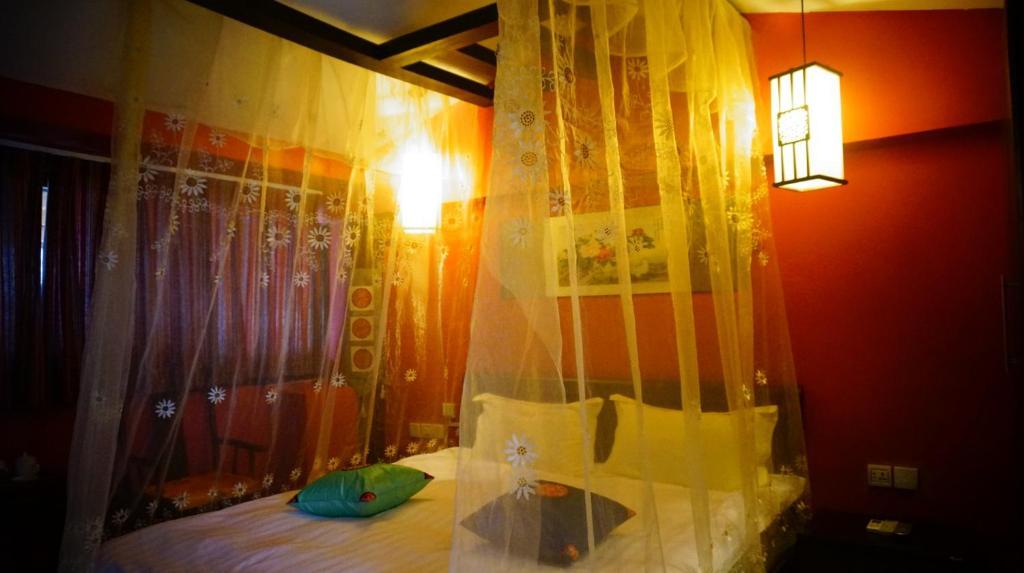 Lijiang Wangjia Courtyard Inn Kamer foto