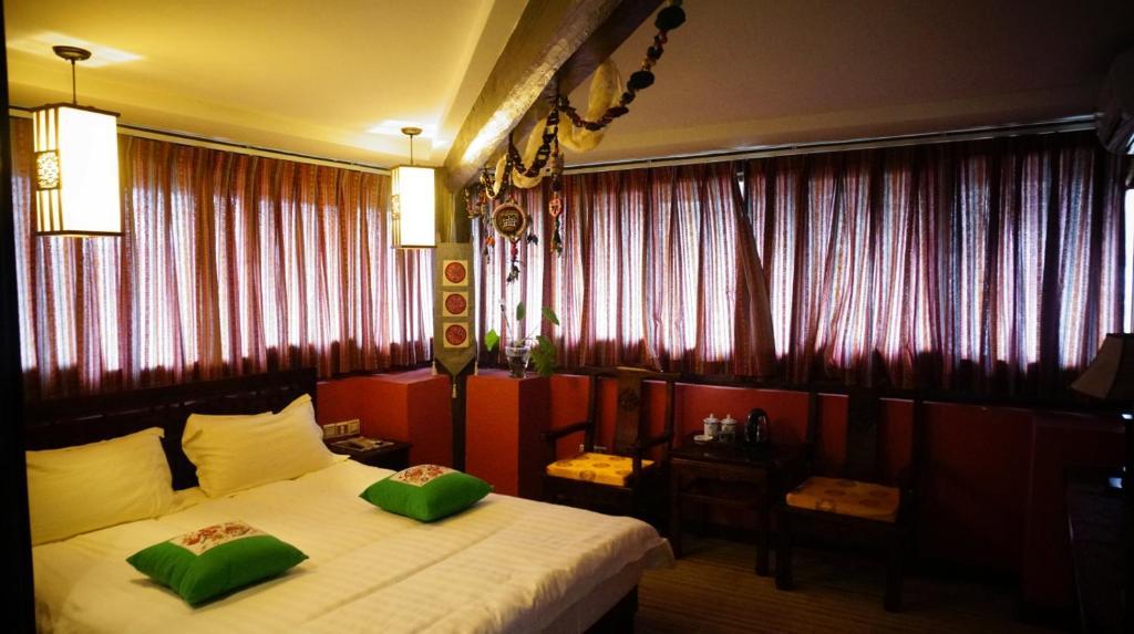Lijiang Wangjia Courtyard Inn Kamer foto